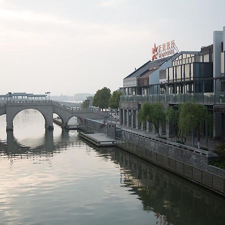 Suzhou Aomu Hotel Exterior photo